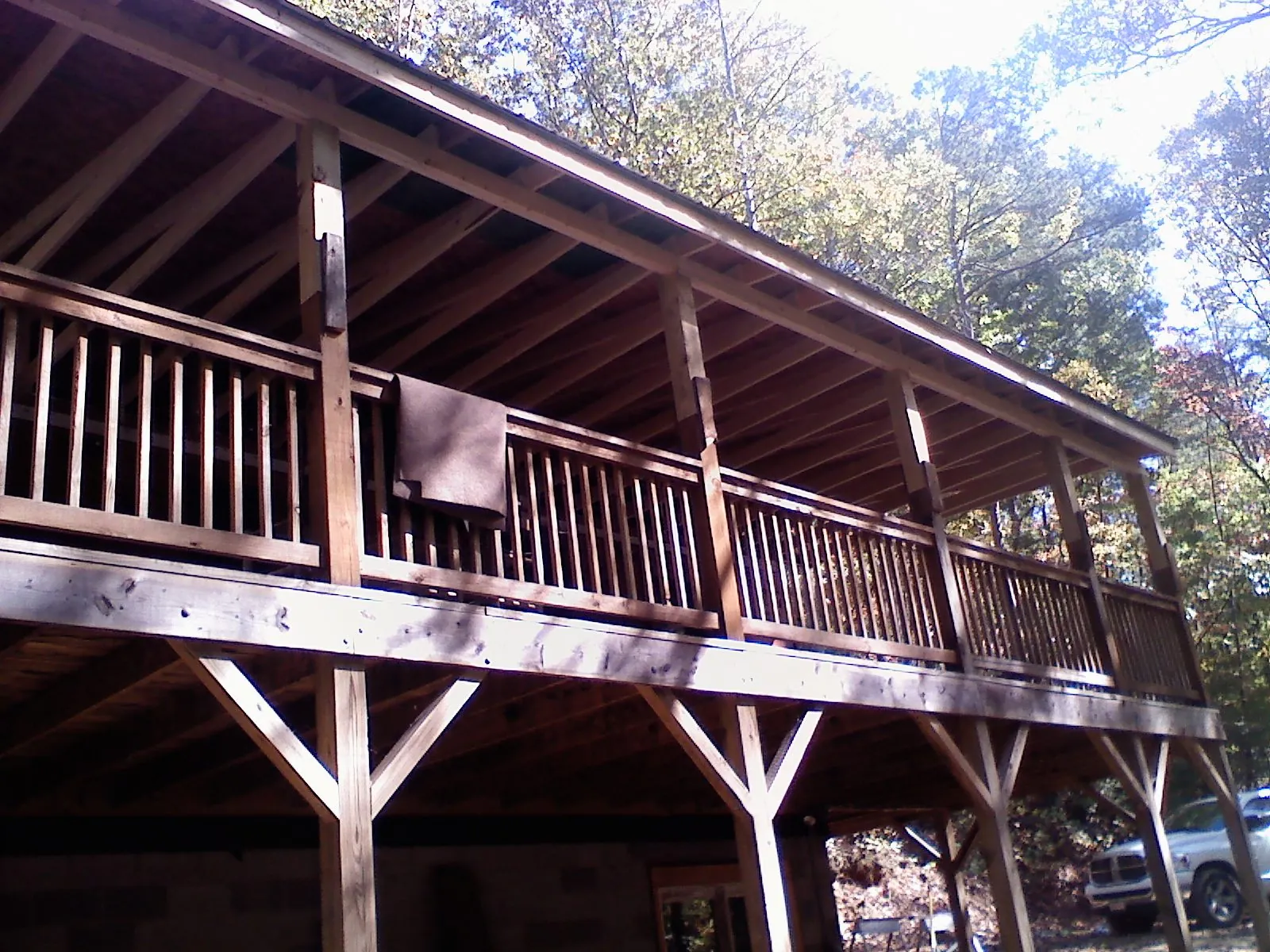 Timber framing under a new elevated porch and deck — Roof Leak Repair in East Setauket by Roofing Brothers